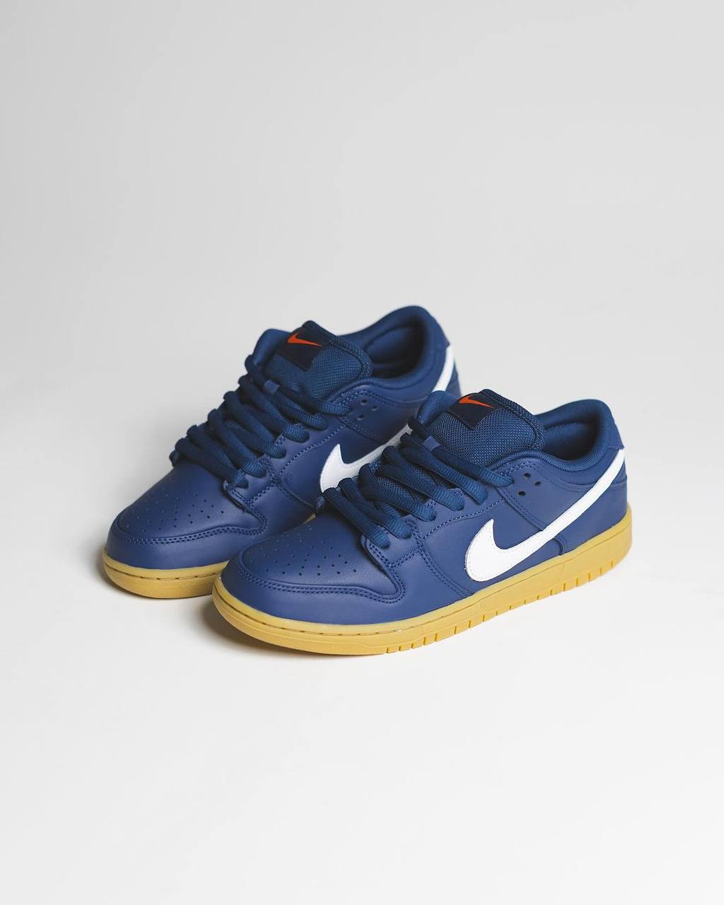 NIKE  DUNK LOW NAVY BLUE GUM SOLE/ ORANGE LABEL