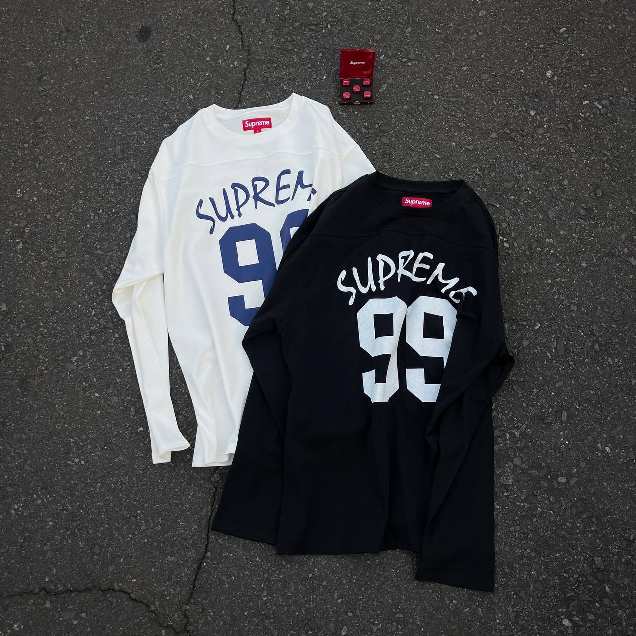 SUPREME 99 L/S  FOOTBALL TOP