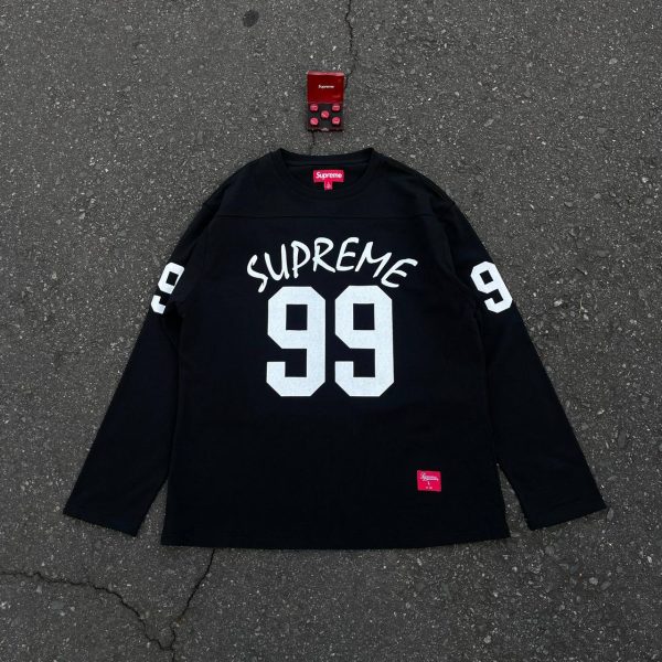 SUPREME 99 L/S  FOOTBALL TOP