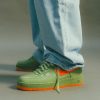 NIKE AIR FORCE 1 LOW PREMIUM ALL PATENT LEATHER IN OIL GREEN