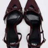 BUCKLED STRAPPY HEELS