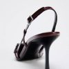 BUCKLED STRAPPY HEELS
