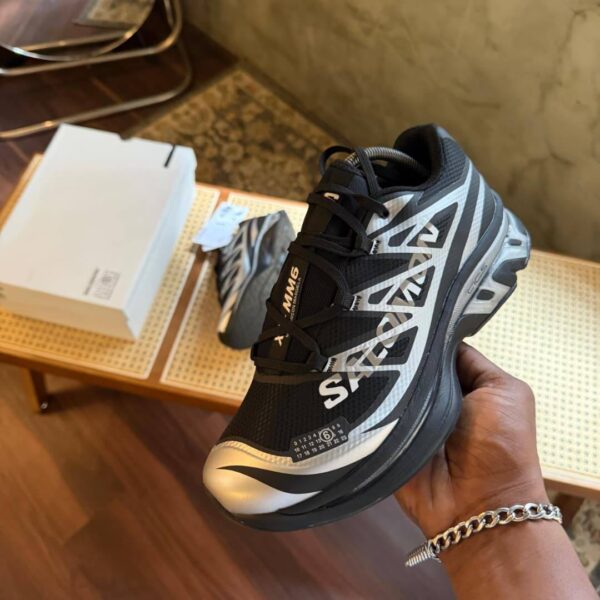 THE SALOMON XT-MM6 MAISON MARGIELA RECONSTRUCTED IN BLACK/SILVER/PHANTOM