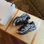 THE SALOMON XT-MM6 MAISON MARGIELA RECONSTRUCTED IN BLACK/SILVER/PHANTOM