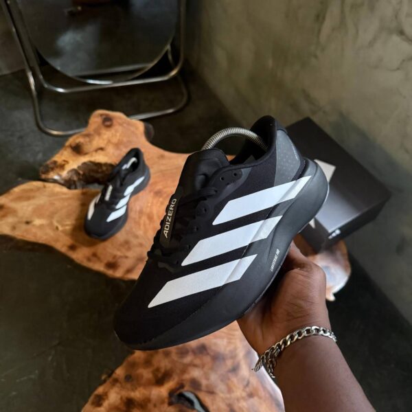 THE ADIDAS ADIZERO EVO  SL