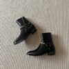 THE WHYTT CHAINED HARNESS RING LEATHER HEELED ANKLE BOOT IN BLACK