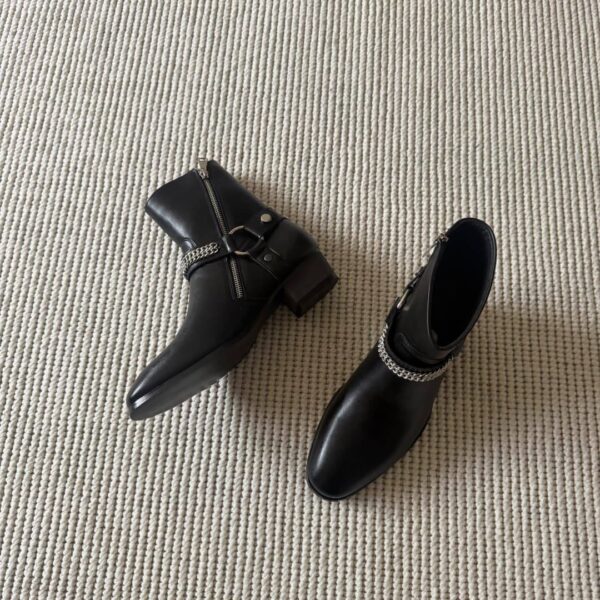 THE WHYTT CHAINED HARNESS RING LEATHER HEELED ANKLE BOOT IN BLACK